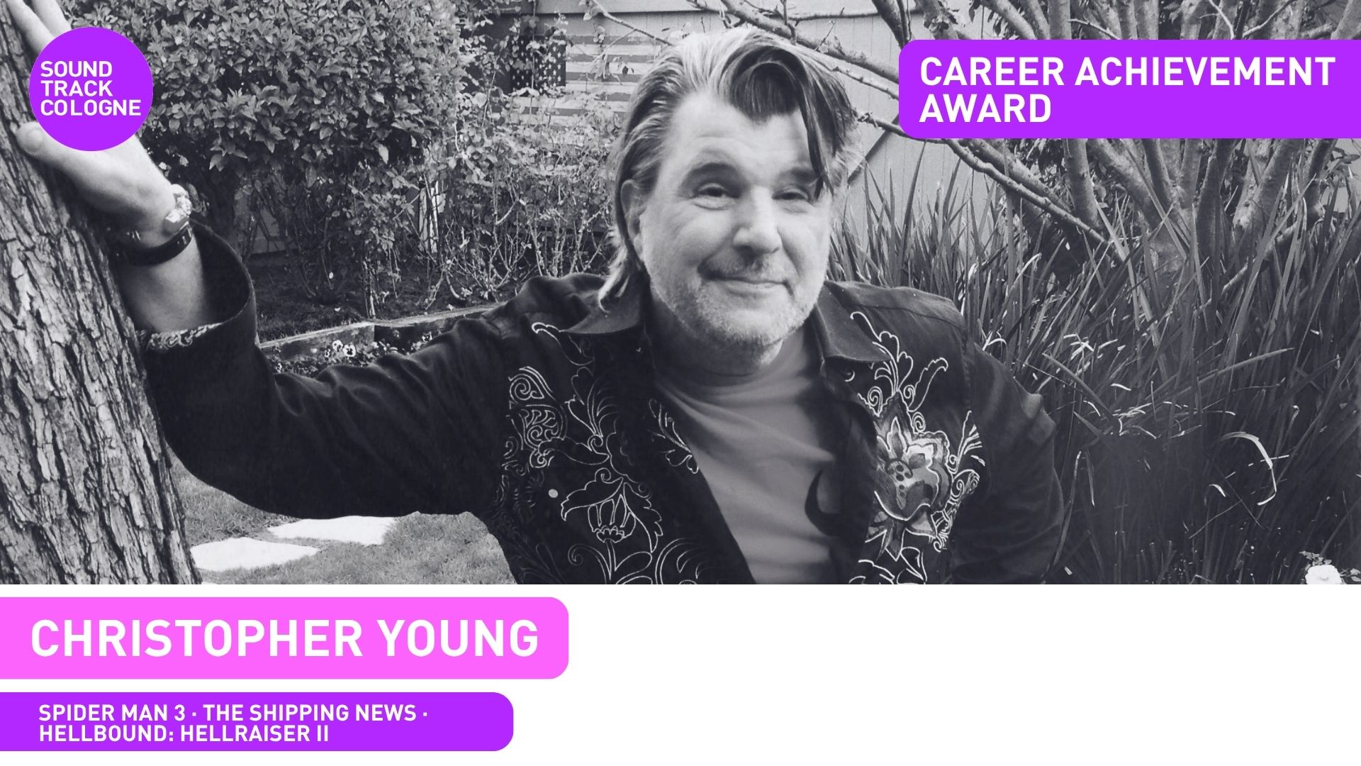 Christopher Young receives the
